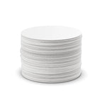 stack of Aeropress coffee filters on white background