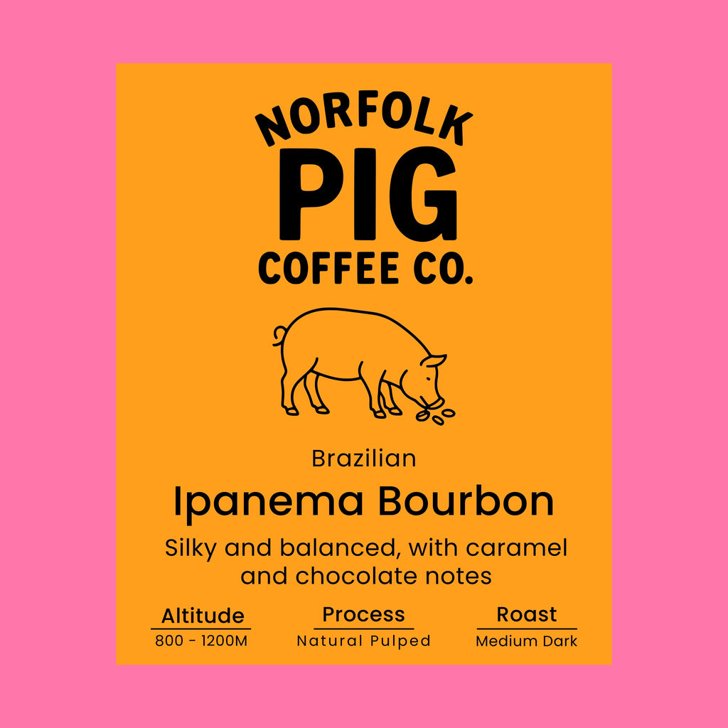 Coffee label for Brazilian Ipanema Bourbon with pig illustration on orange background