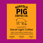 Decaf light coffee label from Norfolk Pig Coffee Co.