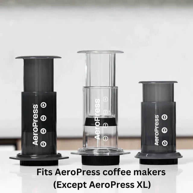 AeroPress coffee maker components on a white background