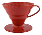 Red Hario coffee filter on a white background