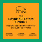 Java Bayukidul Estate Grade 1 coffee label with a pig illustration on an orange background