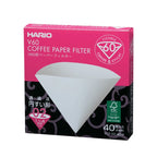 Hario V60 coffee paper filter packaging with pink and black design