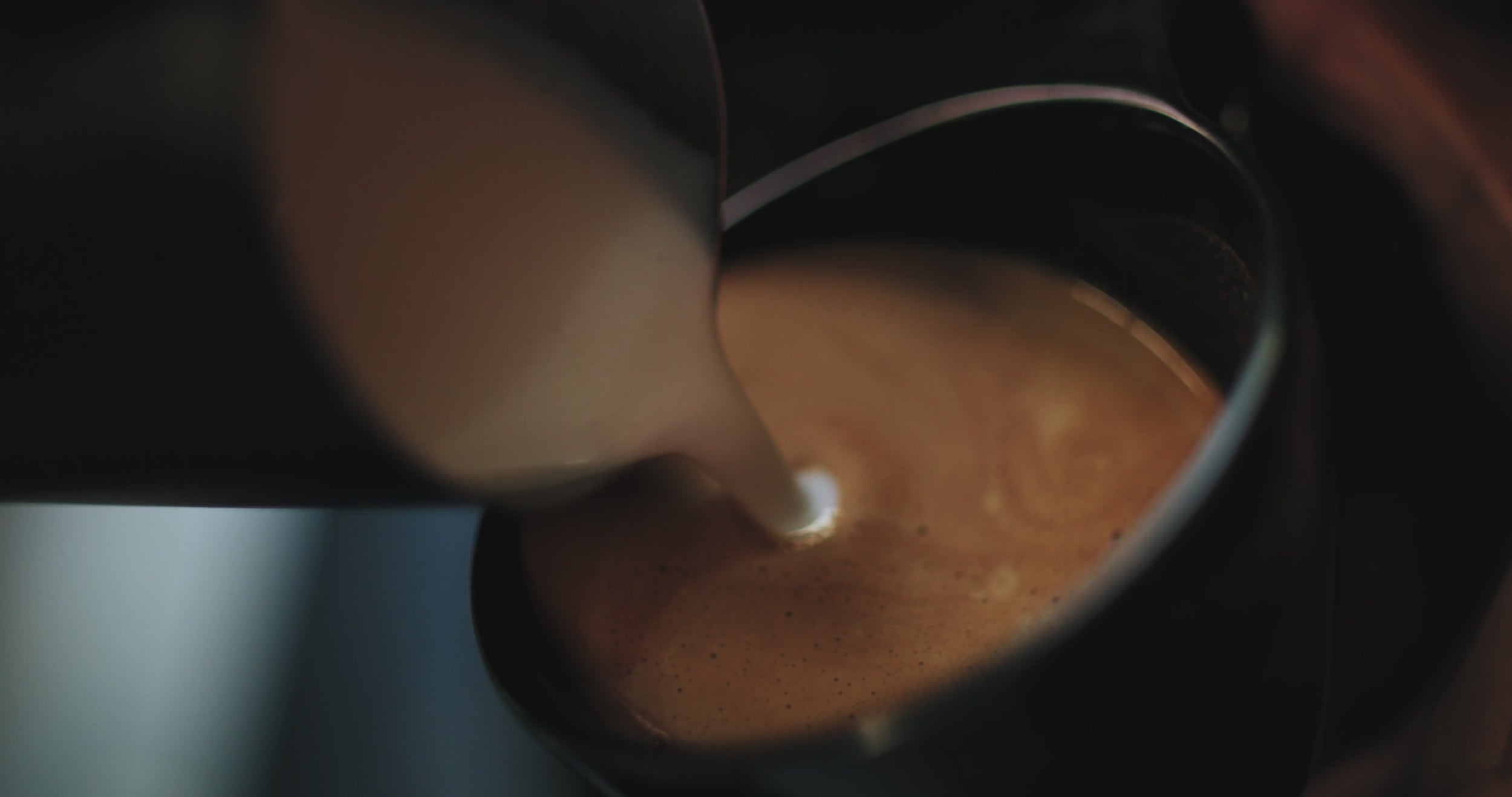 video showing coffee being poured into mug